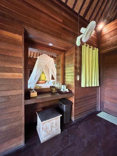 Фотография из галереи Island Cabanas Formerly Taman Sari Villa в городе Нуса-Лембонган