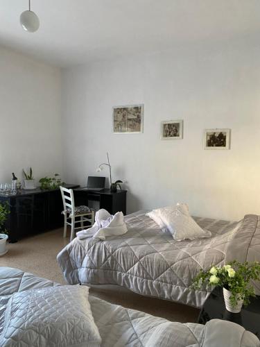 Postel nebo postele na pokoji v ubytování Casa Vacanza Lilia vicino la Stazione e Caserma