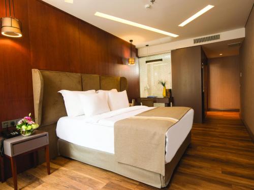Cama o camas de una habitación en Blueway Hotel Historical