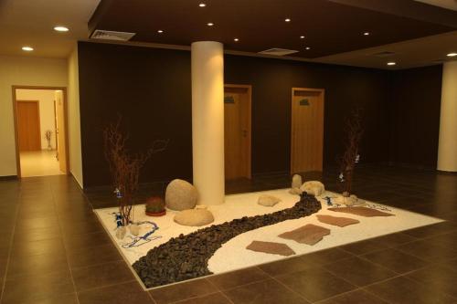 a room with a rug with animals on the floor at PARADISE RELAX APARTMENT in Bansko