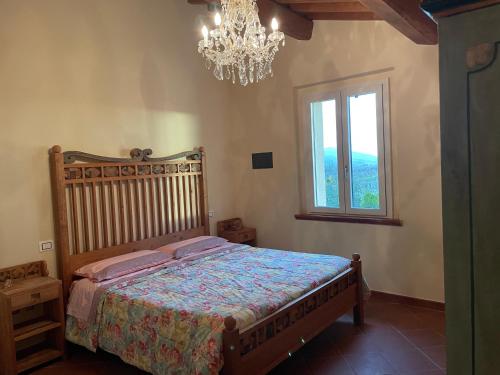 A bed or beds in a room at Villa San Bartolomeo