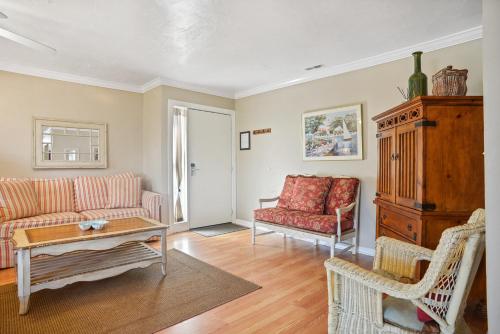 a living room with a couch and a table at 125 Cordillo Parkway in Hilton Head Island
