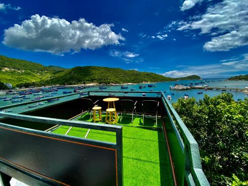 a view of a harbor from the balcony of a boat at Hotel Vũng Găng in Vĩnh Hy