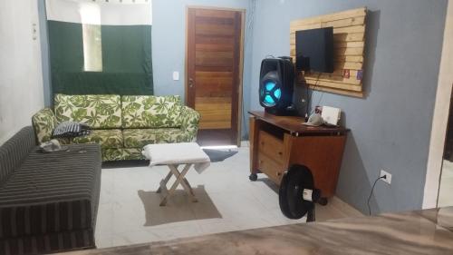 TV a/nebo společenská místnost v ubytování Recanto do Baraúna