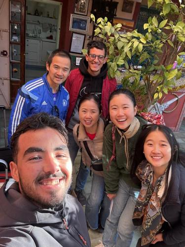 a group of people posing for a picture at Riad Dades Birds in Boumalne