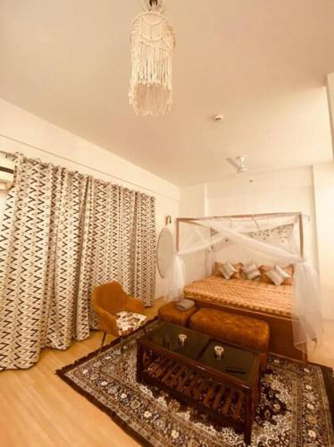 Cama o camas de una habitación en Boho by Kapoor regency
