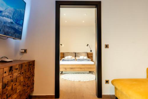 Una cama o camas en una habitación de My Tarvisio home
