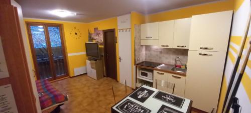 Kuchyň nebo kuchyňský kout v ubytování FOPPOLO apt.C101