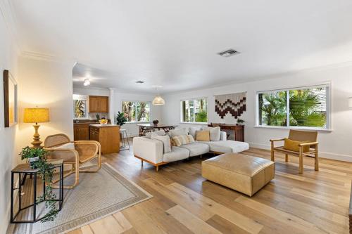 a living room with a couch and a table at Spacious Beach Apt in Las Olas Blvd in Fort Lauderdale