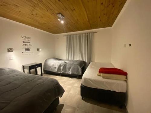 Postel nebo postele na pokoji v ubytování Palmares - Casas Anisacate
