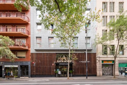 an empty street in front of a building at Arya Stadium Hotel in Barcelona