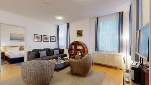 Χώρος καθιστικού στο Villa Strandblick in Binz, FeWos direkt am Strand mit Balkon und teilweise mit Meerblick