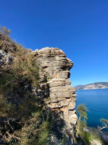 a rock formation on the side of a lake at Z-Villas Beach Hotel in Marmaris