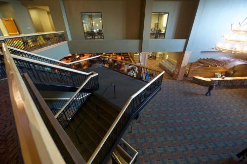 an overhead view of a large building with escalators at Great Wolf Lodge Southern California in Anaheim