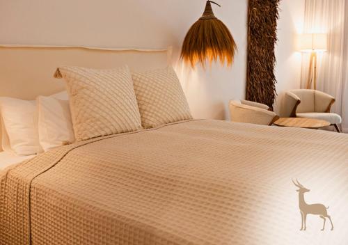 Ένα ή περισσότερα κρεβάτια σε δωμάτιο στο Alcaidesa Boutique Hotel