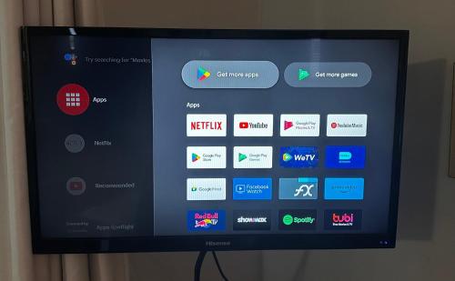 a television screen with many different apps on it at Huisie by die See in Gansbaai