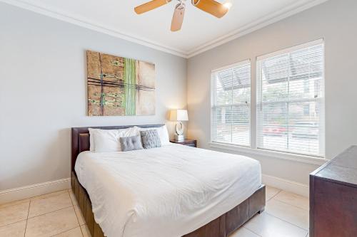 a bedroom with a bed and a ceiling fan at Miramar Beach Villas Building 6 Unit B in Destin