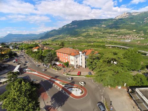 an aerial view of a city with a mountain at Hotel Sant'Ilario in Rovereto