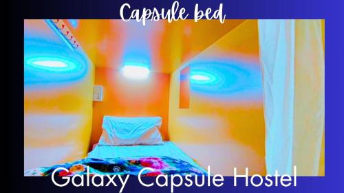 a small bed in a small room with at The Galaxy Star Capsule Near Burjuman Metro Station in Dubai