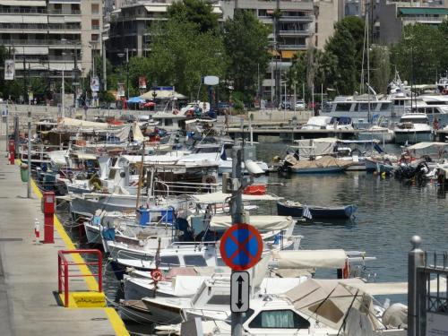 a bunch of boats docked in a harbor at Faros I in Piraeus