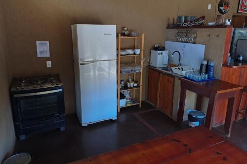 A cozinha ou kitchenette de Savana Hostel