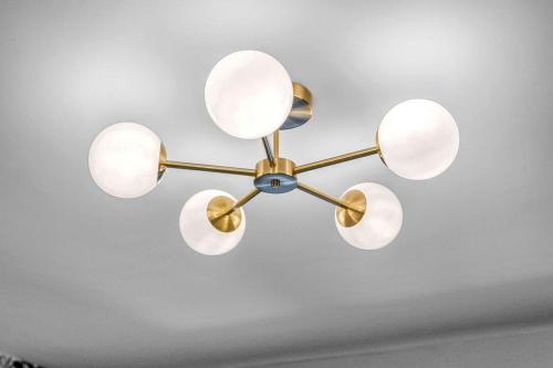a chandelier hanging from a ceiling at West Lothian 5 Beds + car space in Whitburn