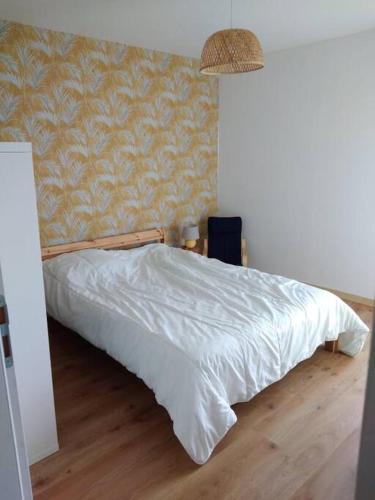 Postel nebo postele na pokoji v ubytování Cottage chaleureux