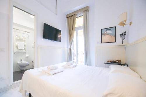 Vuode tai vuoteita majoituspaikassa Caffe' e Cuscino