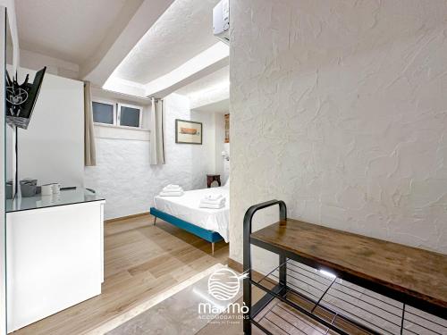 Ein Bett oder Betten in einem Zimmer der Unterkunft MareMò Accomodations - Rooms in Tropea