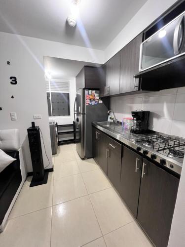 Dapur atau dapur kecil di Apartamento en Pereira