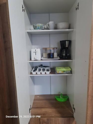 Dapur atau dapur kecil di Sandcastle Beach Apartments