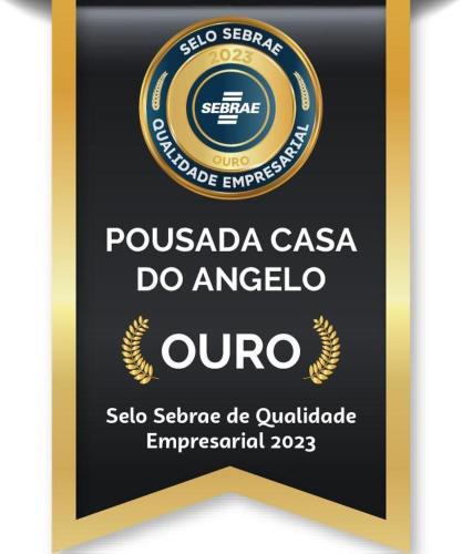 a sign for a consolacion casa do angelicoaquinaquinaquin sauce at Pousada Casa Do Angelo in Jericoacoara