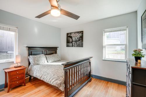 a bedroom with a bed and a ceiling fan at Oakland Apartment with Shared Hidden Backyard Oasis! in Oakland