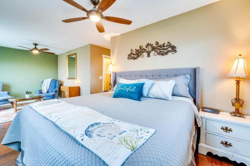 a bedroom with a bed and a ceiling fan at East Wenatchee Home about 2 Mi to Columbia River! in East Wenatchee