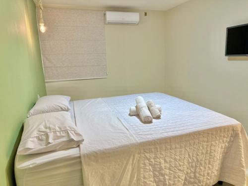 Ein Bett oder Betten in einem Zimmer der Unterkunft Humaita Pousada