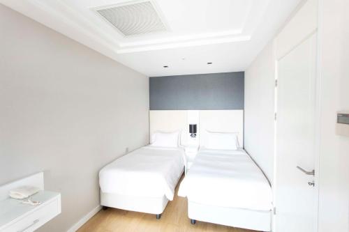 Radisson Residences Avrupa TEM Istanbulにあるベッド