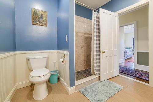 a bathroom with a toilet and a shower at Fly Creek Historic Home By Cooperstown! in Fly Creek