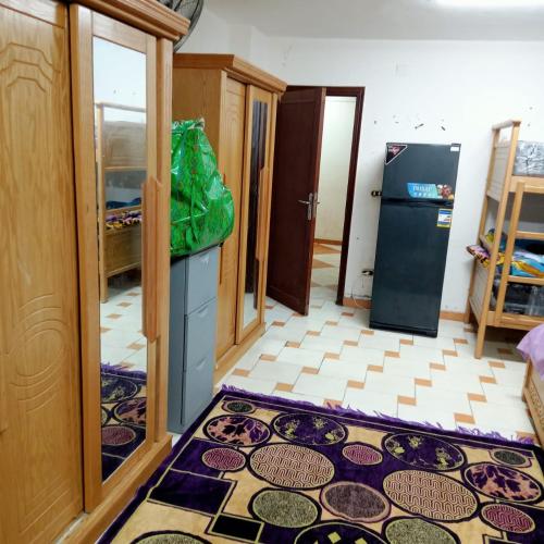 Postel nebo postele na pokoji v ubytování بيت الطالبات والمغتربات