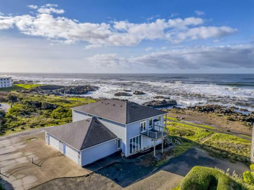an aerial view of a house on the beach at Arbor House North in Yachats