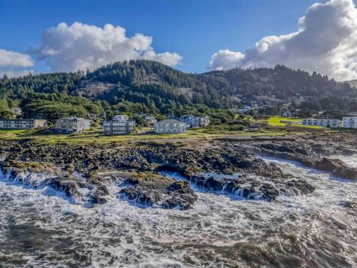 an aerial view of the water at the beach at Arbor House South in Yachats