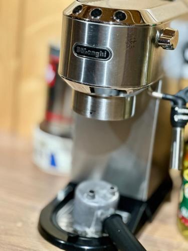 a food processor sitting on top of a counter at Triangle House Parang in Petroşani