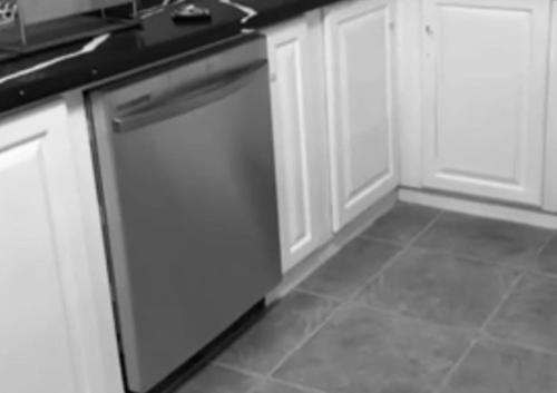 a kitchen with white cabinets and a dishwasher at Eagles Nest Villa House AC TV WIFI Fan Luxury Modern in Albion