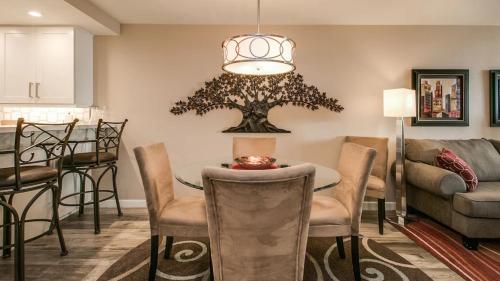 a kitchen and dining room with a table and chairs at Cozy 2-Bdrm Condo in Heart of Old Town Scottsdale in Scottsdale
