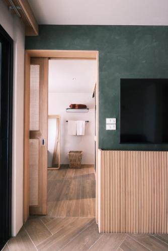 TV a/nebo společenská místnost v ubytování Punnpreeda Beach Resort - SHA Plus Certified
