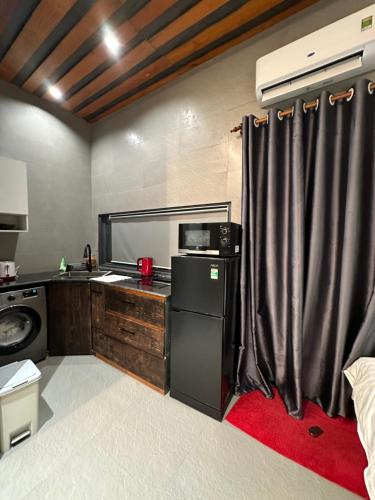 A kitchen or kitchenette at MAY HOME Ninh Chu