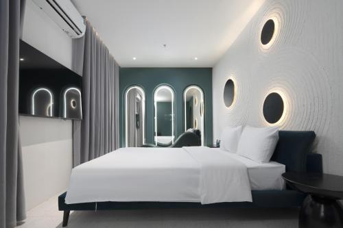Postel nebo postele na pokoji v ubytování Jacayl Hotel - Hà Đông