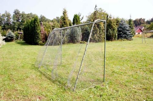 a soccer net in a field in the grass at chalupa Stritez in Střítež