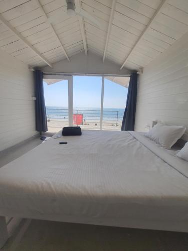 เตียงในห้องที่ Palolem Beach View Inn