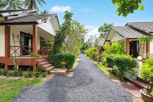 a house with a pathway leading to it at Tropical Heavens Garden Samui in Lipa Noi