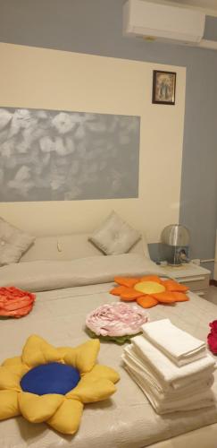 Ένα ή περισσότερα κρεβάτια σε δωμάτιο στο El Giardino delle Rose.....
